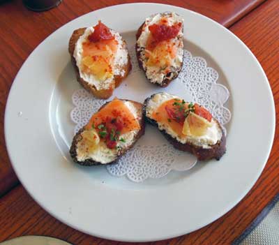 amuse bouche of salmon and garnish on toasts for 4