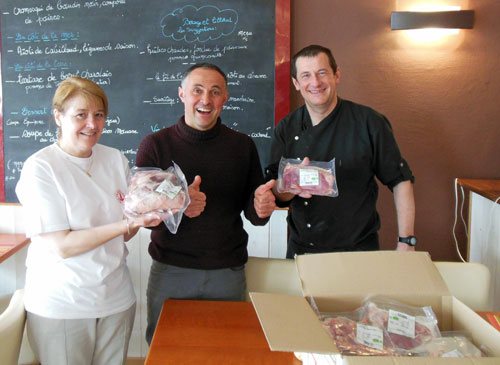 photo of lamb farmer delivering product to restaurant